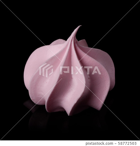 Meringue cookie. Sweet crispy twisted meringue isolated on black background with reflection. Meringue cookie. Sweet crispy twisted meringue isolated on black background with reflection. 58772503