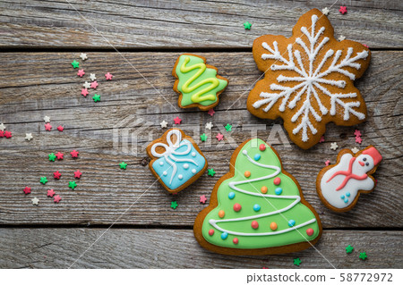 Christmas cookies on rustic wood background 58772972