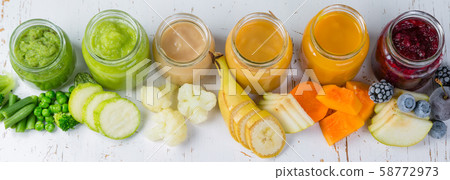Colorful baby food purees in glass jars 58772973