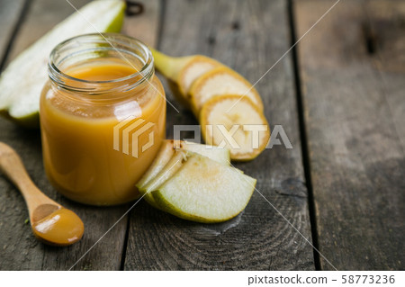 Colorful baby food purees in glass jars 58773236