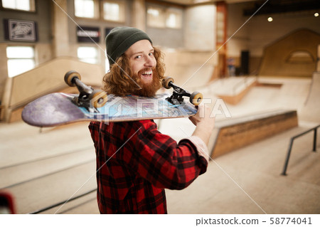 Bearded Skater Smiling at Camera Bearded Skater Smiling at Camera 58774041