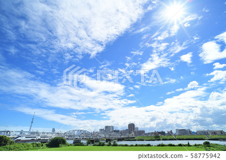 Keisei Skyliner that runs under the blue sky 58775942