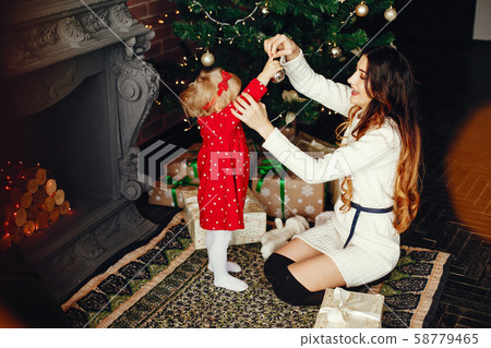 Mother with cute daughter at home 58779465
