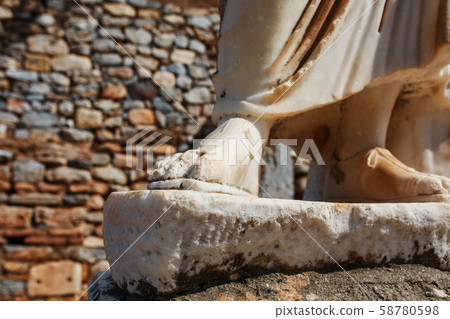 Elements of marble legs of an ancient statue of 58780598