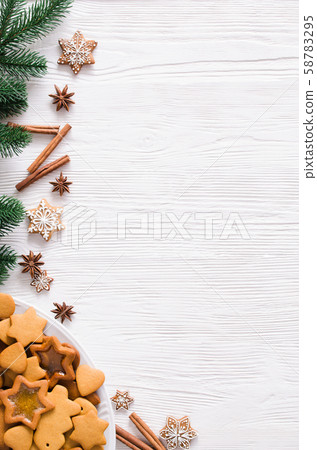 Christmas and culinary background with a plate of freshly baked Christmas gingerbread, Christmas and culinary background with a plate of freshly baked Christmas gingerbread, 58783295