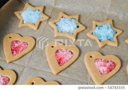 The process of making cookies and Christmas gingerbread at home. The process of making cookies and Christmas gingerbread at home. 58783335