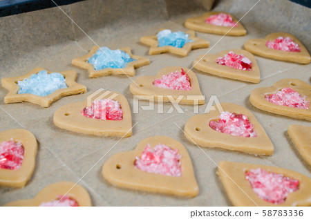 The process of making cookies and Christmas gingerbread at home. The process of making cookies and Christmas gingerbread at home. 58783336