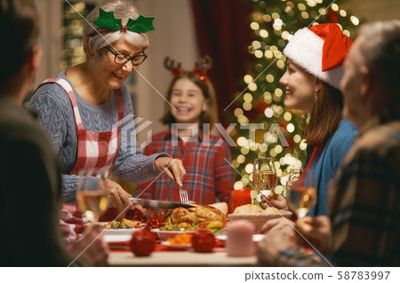 family celebrating Christmas family celebrating Christmas 58783997