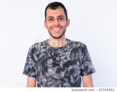 Face of happy young bearded Persian man smiling Face of happy young bearded Persian man smiling 58784491