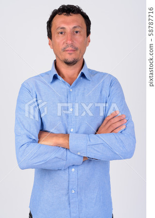 Portrait of mature businessman with arms crossed 58787716