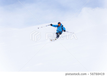 Image of sports man with beard skiing 58788419