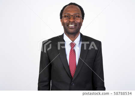 Portrait of happy African businessman wearing suit 58788534