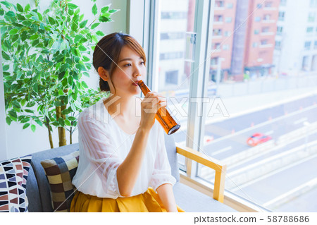 Image of drinking at home, person, adult, female, liquor, drink, relax, lifestyle, home break, change of mood Image of drinking at home, person, adult, female, liquor, drink, relax, lifestyle, home break, change of mood 58788686