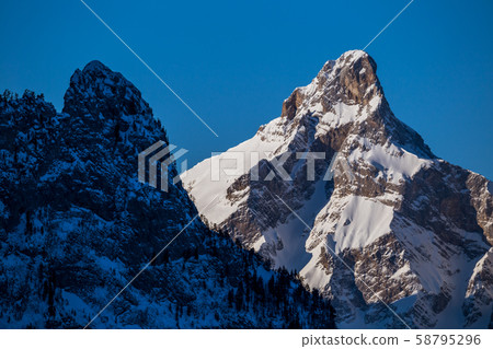 Mountain peaks in the shade and sunlit 58795296