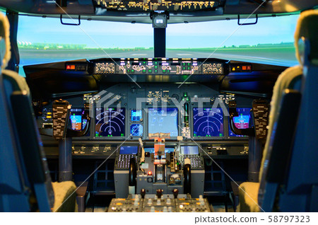 Inside flight simulator cockpit training 58797323