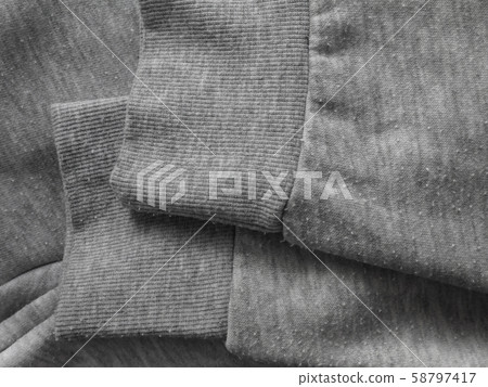 Pills on the heather gray sweatshirt fabric Pills on the heather gray sweatshirt fabric 58797417