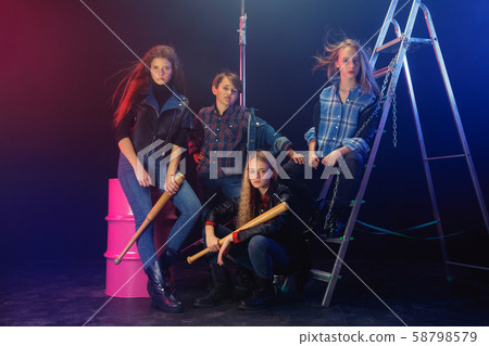 Full length portrait of cute little kids in stylish jeans clothes looking at camera and smiling 58798579