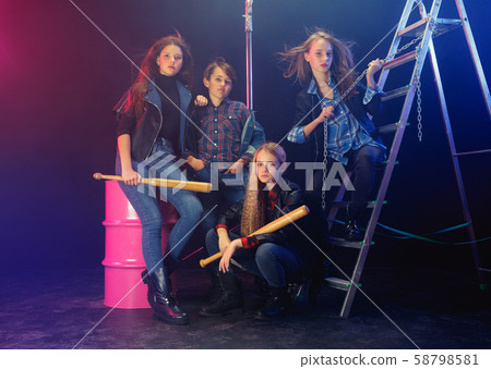 Full length portrait of cute little kids in stylish jeans clothes looking at camera and smiling 58798581