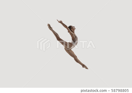 Modern ballet dancer. Contemporary art ballet. Young flexible athletic woman. 58798805