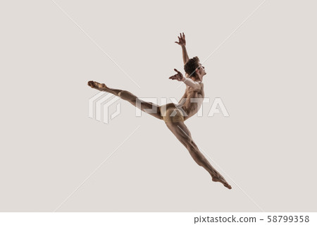Modern ballet dancer. Contemporary art ballet. Young flexible athletic man. 58799358