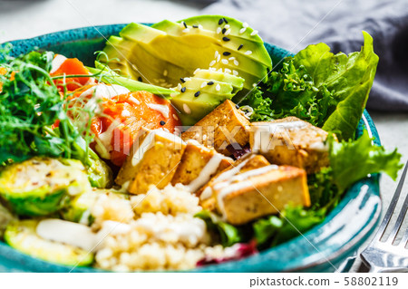 Buddha bowl with quinoa, tofu, avocado Buddha bowl with quinoa, tofu, avocado 58802119
