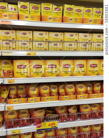 Tea powder is sold in commercial packages and displayed on supermarket shelves for sale. Organized by the brand to facilitate customers. Tea powder is sold in commercial packages and displayed on supermarket shelves for sale. Organized by the brand to facilitate customers. 58803881