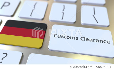 CUSTOMS CLEARANCE text and flag of Gemany on the buttons on the computer keyboard. Import or export 58804025