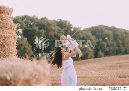 mother small daughter white dresses field straw mother small daughter white dresses field straw 58805347