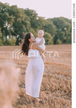 mother small daughter white dresses field straw 58805348