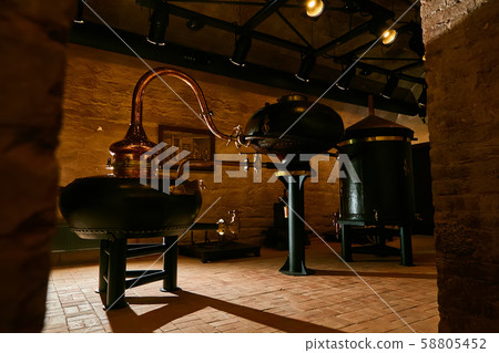 medieval traditional distiller, cube made from copper production of alcohol, cognac, whiskey medieval traditional distiller, cube made from copper production of alcohol, cognac, whiskey 58805452