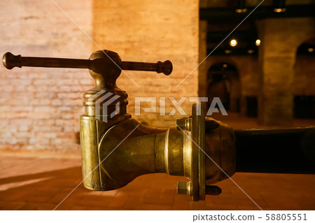 Detalis of medieval traditional distiller cube made from copper production of alcohol, cognac 58805551