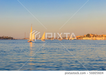 Felucca boats sailing on the Nile river in Luxor 58805604