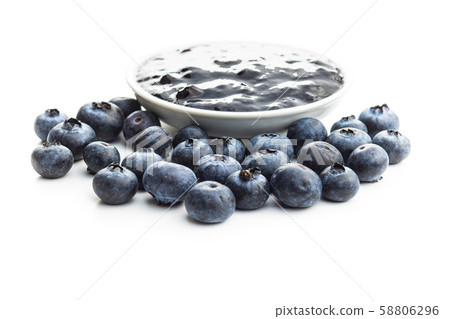 Sweet blueberry jam and blueberries. Sweet blueberry jam and blueberries. 58806296