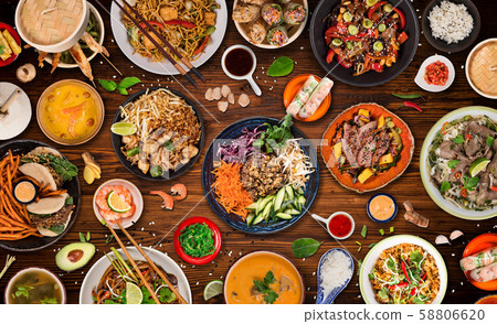 Asian food background with various ingredients on rustic stone background , top view. Asian food background with various ingredients on rustic stone background , top view. 58806620