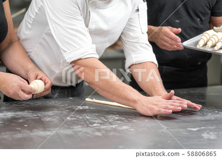 Baker concept. Make croissant on table , fresh bakery. 58806865