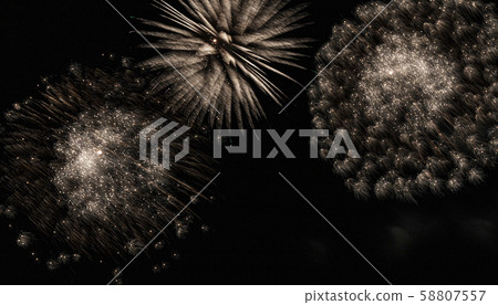 Three large white fireworks explode and move in Three large white fireworks explode and move in 58807557