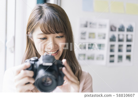 Female business woman camera 58810607