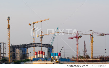 Construction cranes in building construction Construction cranes in building construction 58814483