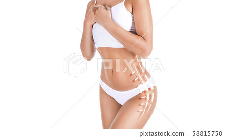 Female tanned body with lines and arrows over white background. Fat removing concept. 58815750