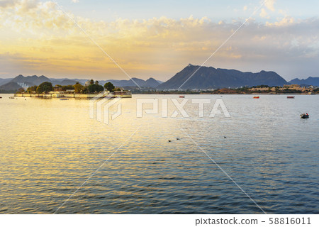Sunset at Pichola Lake in Udaipur. India 58816011