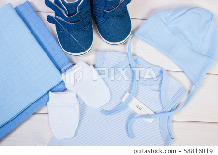 Pregnancy test with positive result and clothing Pregnancy test with positive result and clothing 58816019