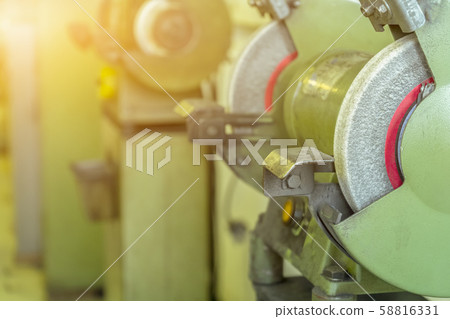 Grinding machine in factory on the mold shop Grinding machine in factory on the mold shop 58816331