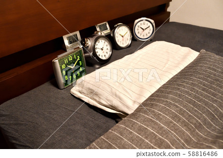 A large number of alarm clocks that do not wake up in the morning A large number of alarm clocks that do not wake up in the morning 58816486