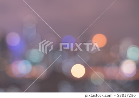 Blur abstract background with light bokeh in purple violet vintage color of a scenic view of Bangkok cityscape at night. 58817280