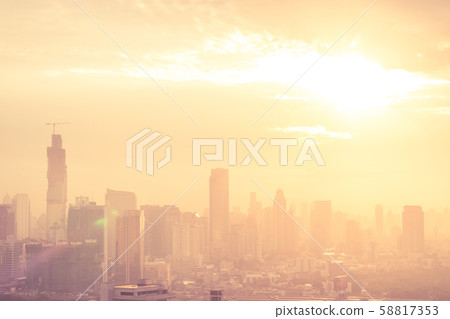 Blur background of morning light on sky with bokeh and sun flare at Bangkok city night life Blur background of morning light on sky with bokeh and sun flare at Bangkok city night life 58817353