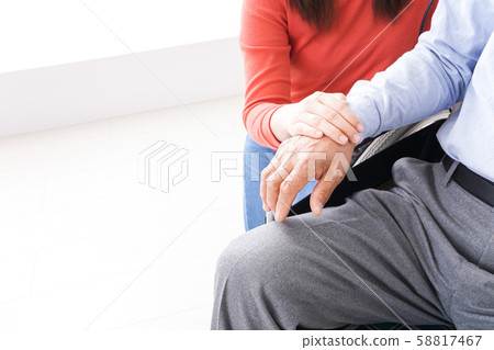 Women who care for the elderly Women who care for the elderly 58817467