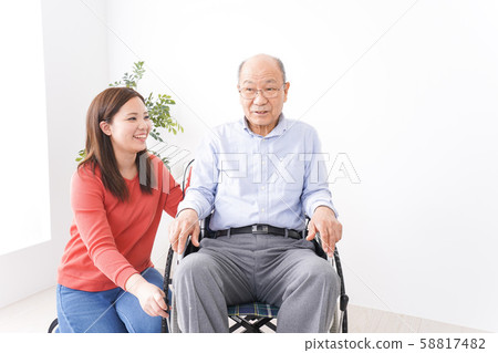 Women who care for the elderly Women who care for the elderly 58817482