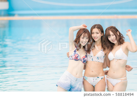 Woman enjoying in the pool 58818494