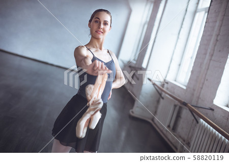Young ballet dancer finished practice in studio active lifestyle Young ballet dancer finished practice in studio active lifestyle 58820119