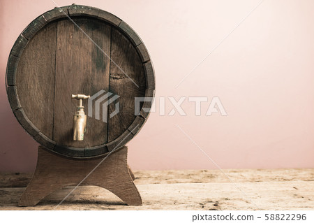 Beautiful wooden barrel with tap and worn old Beautiful wooden barrel with tap and worn old 58822296